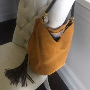 Hobo mustard suede with light blue patten inside